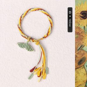 Customizable yellow fish tail bracelet. Handcrafted accessory with a vibrant ocean-inspired design.