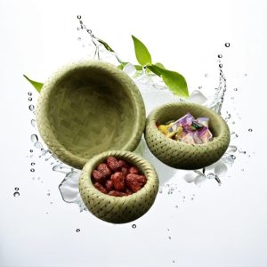 Handwoven bamboo basket with intricate patterns and natural finish.