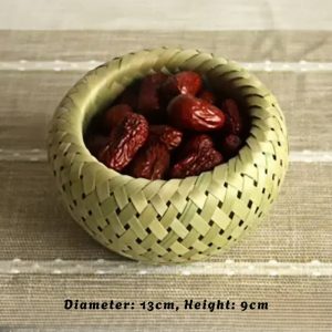 Handwoven small bamboo basket, intricate details, natural fiber texture