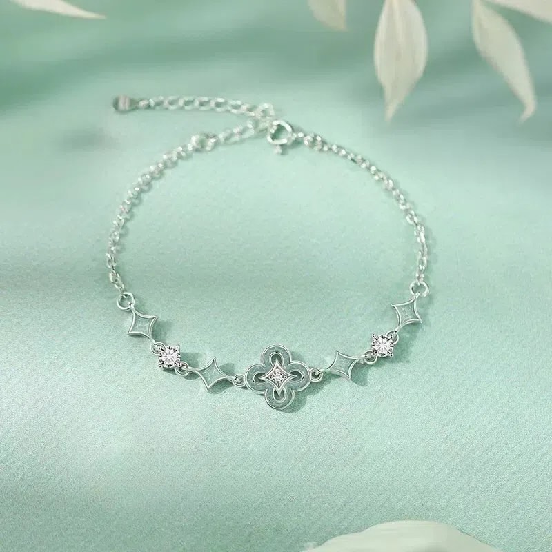 Close-up of a handcrafted sterling silver bracelet with blue and white porcelain-inspired hues, exquisitely detailed and perfect for Valentine's Day and birthday gifts.