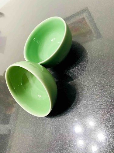 review for a beautifully crafted Longquan Celadon bowl, ideal for dining, showcasing a classic blue-green glaze.