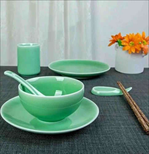 review for a beautifully crafted Longquan Celadon bowl, ideal for dining, showcasing a classic blue-green glaze.